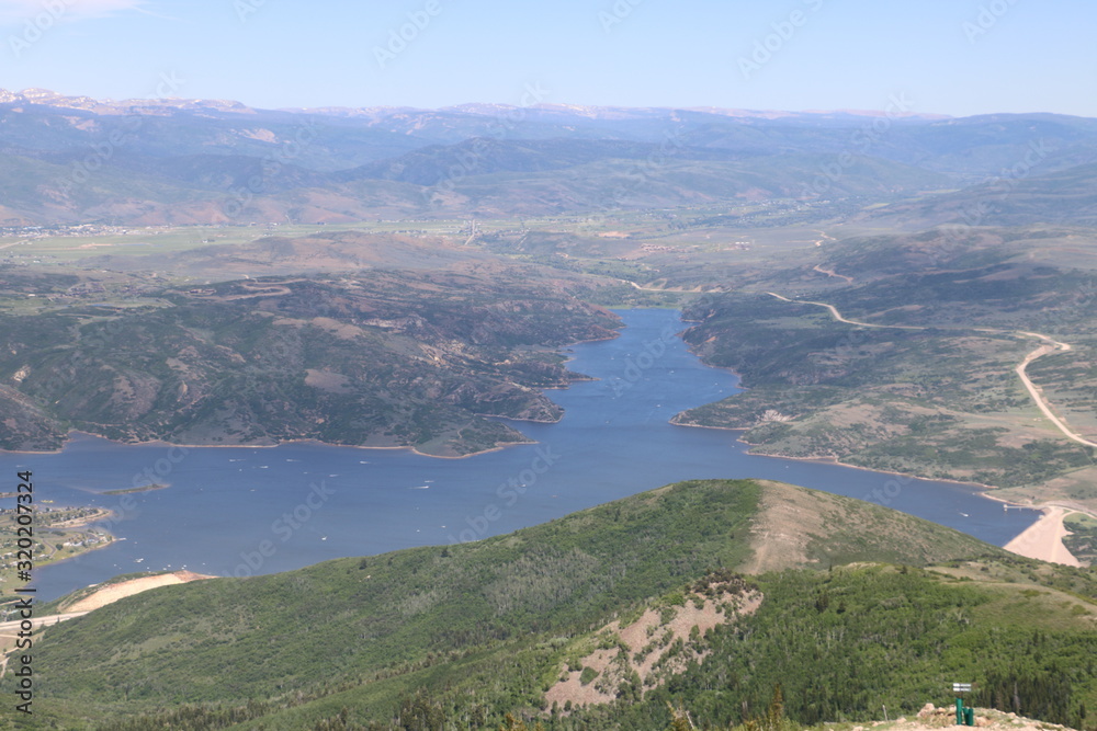 Jordanelle Reservoir with the countryside of Wasatch County as seen from Deer Valley resort in Park City, Utah