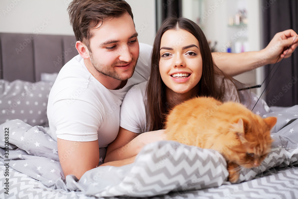 Intimate sensual young couple in bedroom enjoying each other Intimate sensual young couple in bedroom enjoying each other