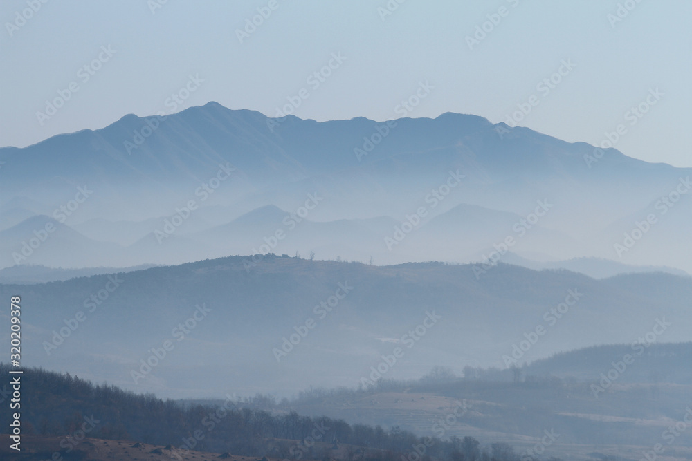 mountains in the fog