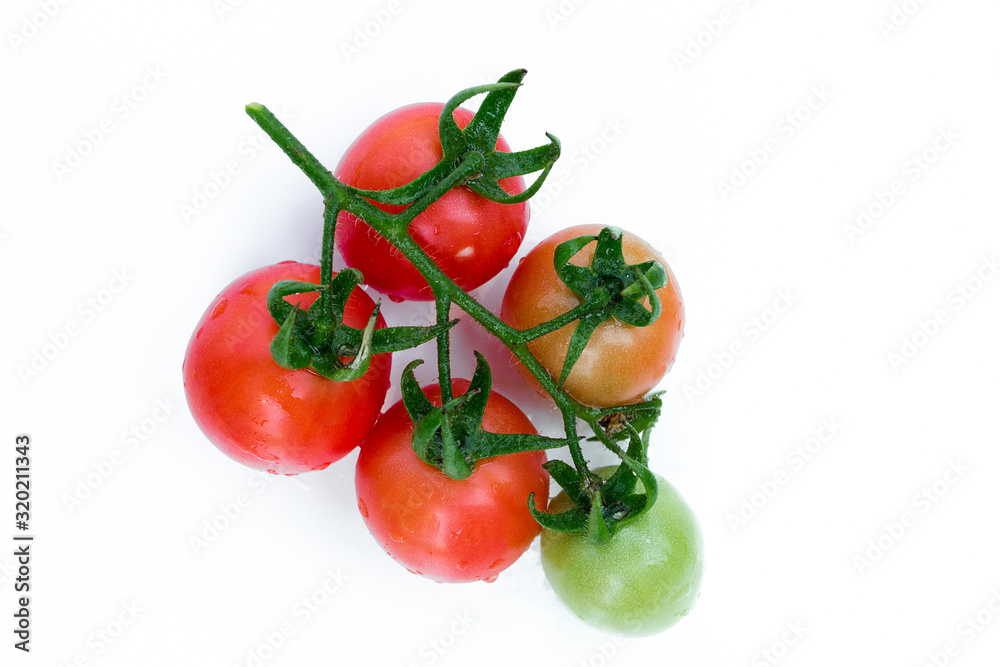 Fresh tomatoes on a white background.