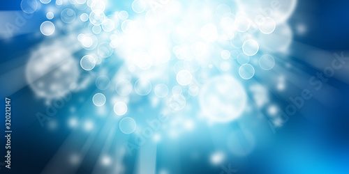 white circle on blue blur abstract background. bokeh Christmas blurred beautiful shiny Christmas lights