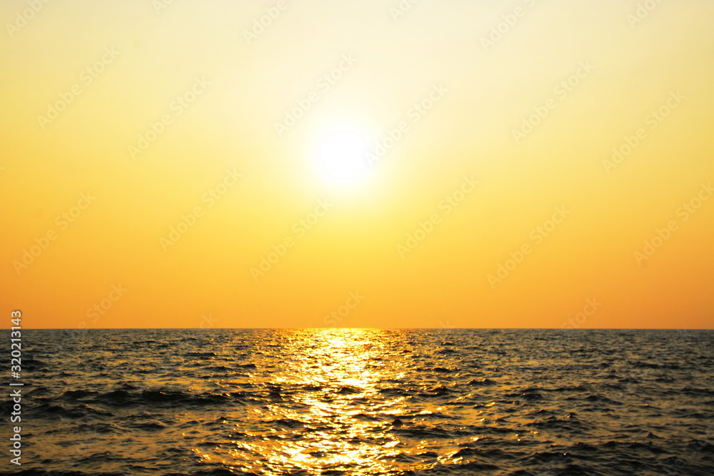 sun set over the sea in the evening