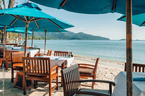 Romantic outdoor beach cafe on the tropical island in Thailand