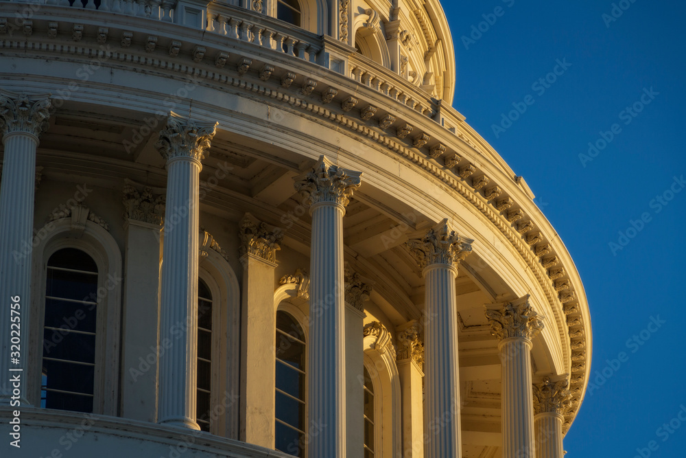 The late afternoon sun hits the capitol building in Sacramento, California