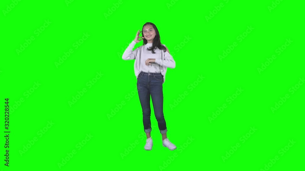 Happy teenage girl dancing in the studio Happy teenage girl dancing in the studio