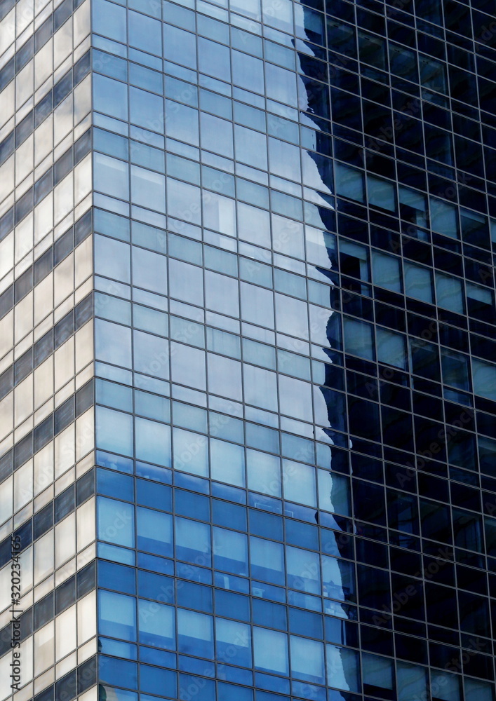 Abstract minimalist architecture,modern office building with reflection in windows of building Abstract minimalist architecture,modern office building with reflection in windows of building