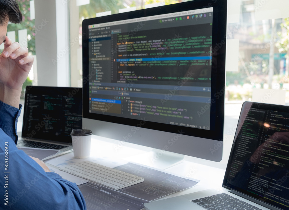 Programmers work on the development of coding and coding technology on white desks and website design, software, data processing companies, servers. Programmers work on the development of coding and coding technology on white desks and website design, software, data processing companies, servers.