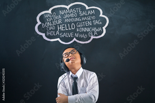 Boy with headphones and different greeting words