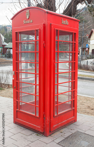 red telephone booth or cabin in Sinaia, Romania © Ioan Panaite