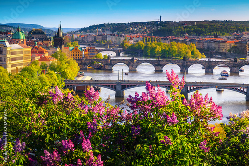 Wonderful spring panorama of Prague with river and bridges