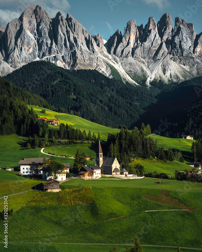 Church at saint magdalena with italian alps mountain in background in Italy.