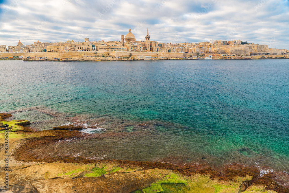 Valletta, Malta old town skyline from Sliema city on the other side of Marsans harbor