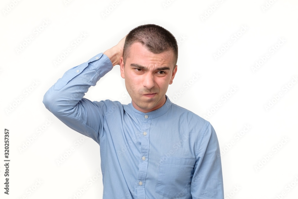 Hispanic young man thinking about idea or making a choice. Hispanic young man thinking about idea or making a choice.