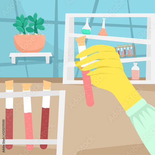 The hand of a chemist or biologist in a rubber glove holds a test tube. Viral disease. Epidemic.