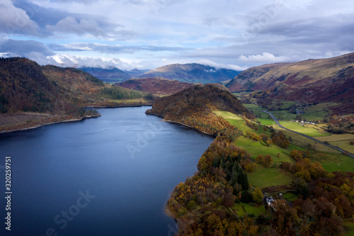 Stunning aerial drone landscape image of glorious vibrant Autumn Fall sun over Thirlmere in Lake District © veneratio