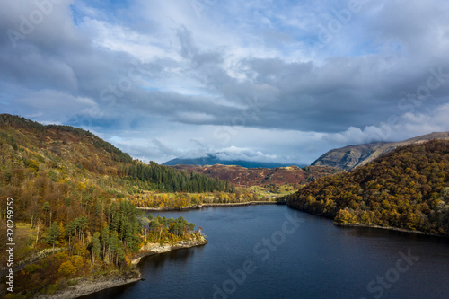 Stunning aerial drone landscape image of glorious vibrant Autumn Fall sun over Thirlmere in Lake District © veneratio
