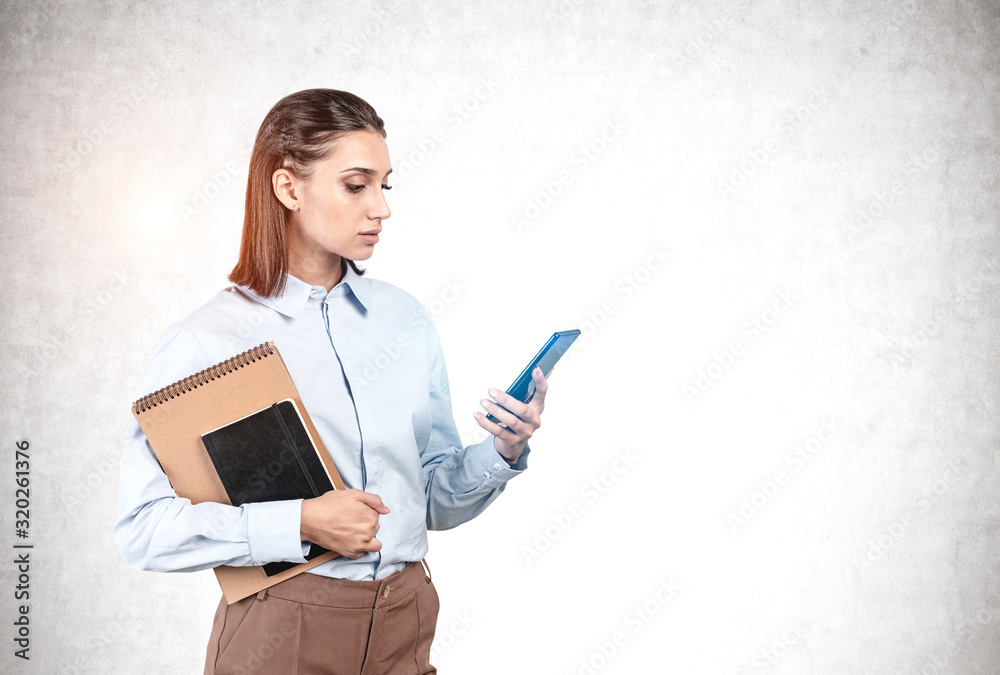 Woman with smartphone and notebook, mock up Woman with smartphone and notebook, mock up
