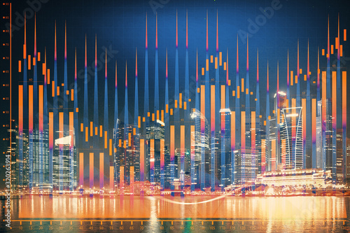Financial chart on city scape with tall buildings background multi exposure. Analysis concept. © peshkova