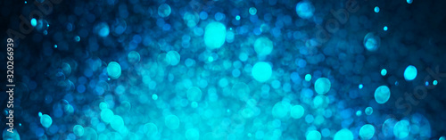 Abstract blue bokeh light background,banner web