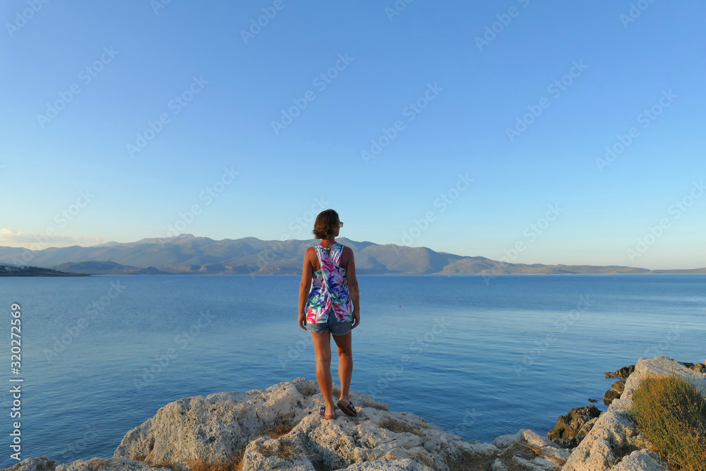 A woman admires the panorama from the fortress of Monemvasia