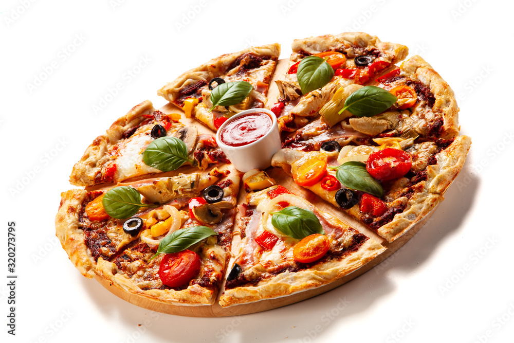 Sliced pizza with ham and artichoke on white background Sliced pizza with ham and artichoke on white background