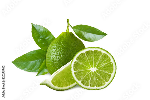 Green fresh lime and lime slices with leaves isolated on white background with shadow