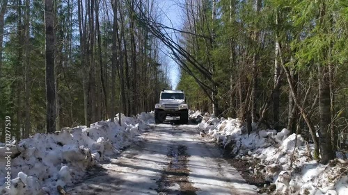 all-terrain vehicle trekol in the forest in winter. photo