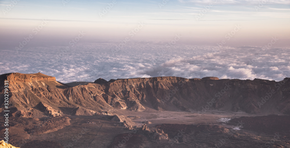 View from the top of Mount Teide in Tenerife at Dusk, Surrounded by a sea of clouds