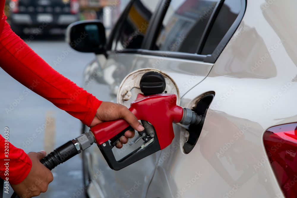 Car refueling on the petrol station.