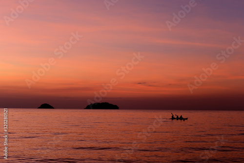 Beautiful sunset at the beach in the tropics. Sky and ocean