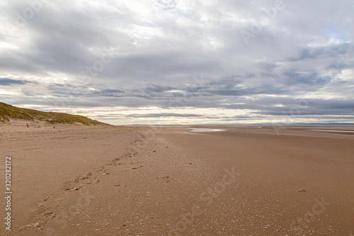 Canvas Print The vast sandy beach at Formby in Merseyside, at low tide