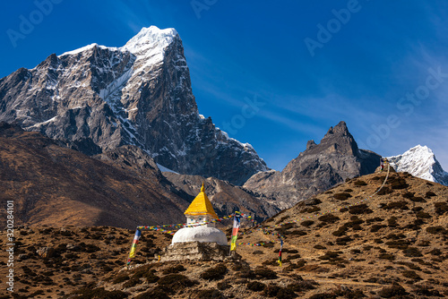 Stupa near Dingboche village with prayer flags - way to mount Everest base camp - Khumbu valley - Nepal