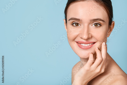 Beautiful young woman with ...