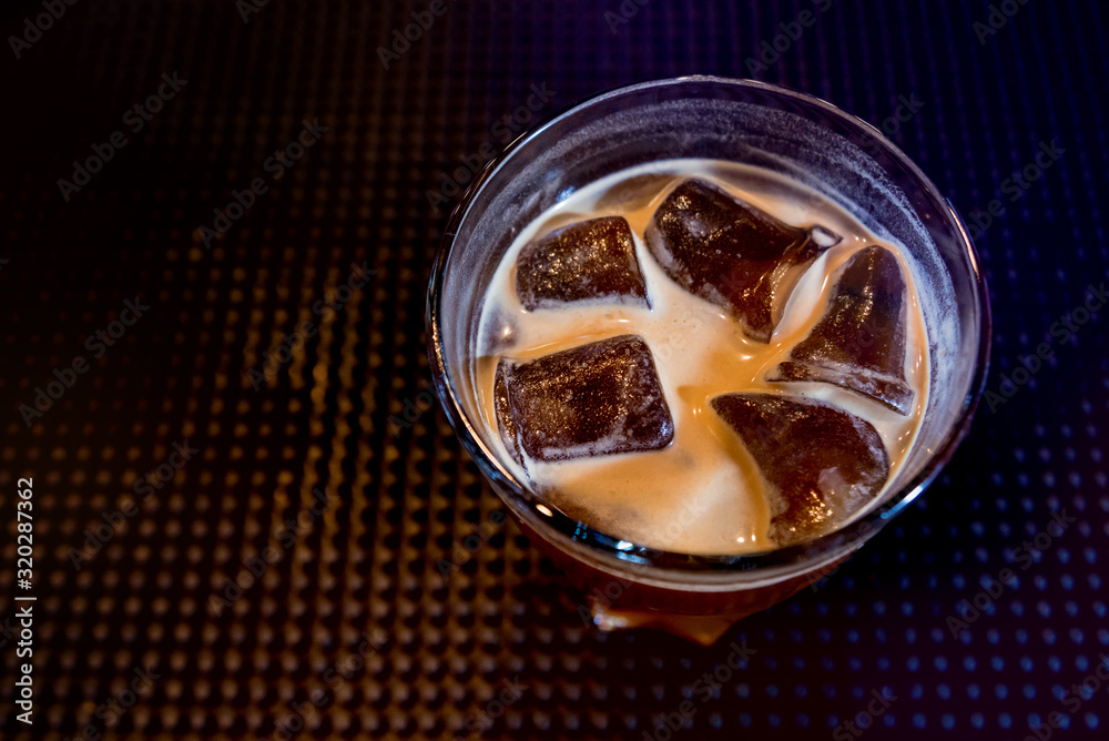 Alcoholic cocktail with ice at wooden bar counter. Restaurant. Alcoholic cocktail with ice at wooden bar counter. Restaurant.