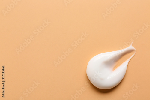 Sample of cream on color background