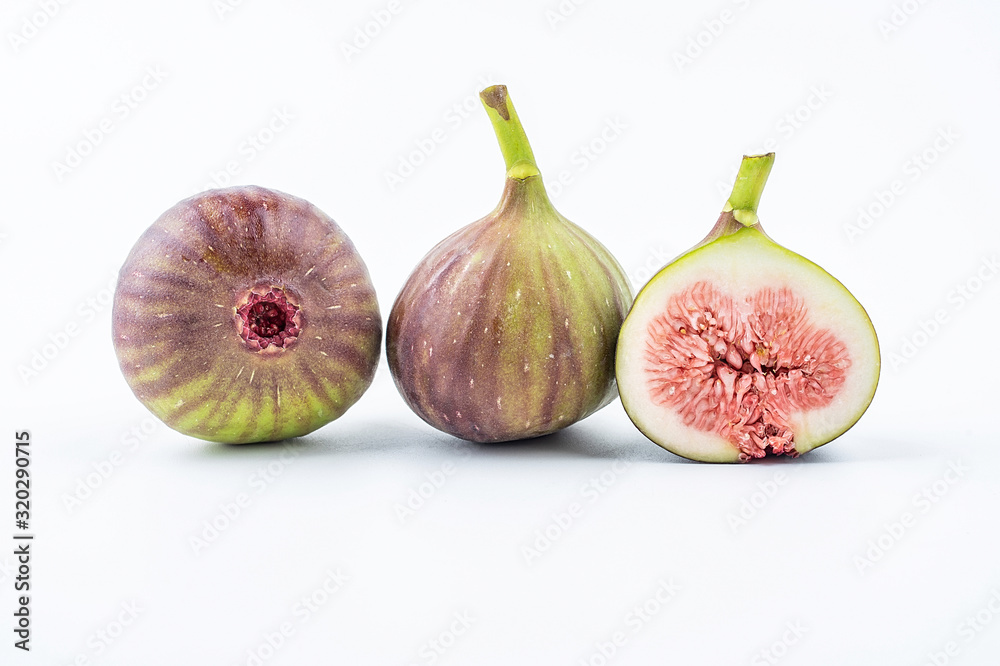 Fresh fruit fig slices on white background Fresh fruit fig slices on white background