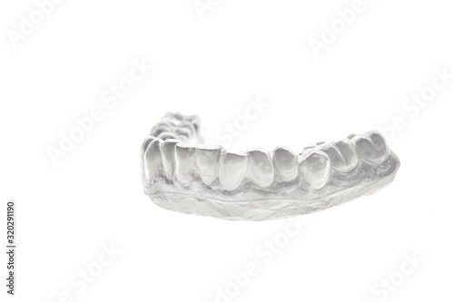 Bleaching orthodontics tray for teeth on gypsum model photo