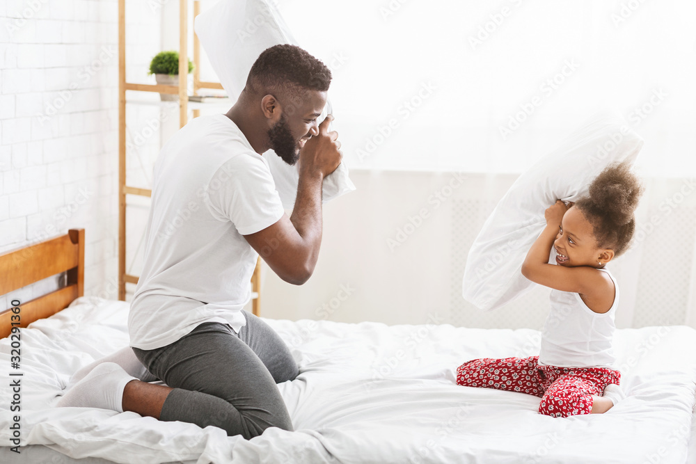 Joyful father and daughter having fun in the morning Joyful father and daughter having fun in the morning