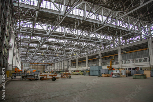 Interior of an abandoned industrial workshop. MIG Aircraft Building Plant in Moscow, Russia