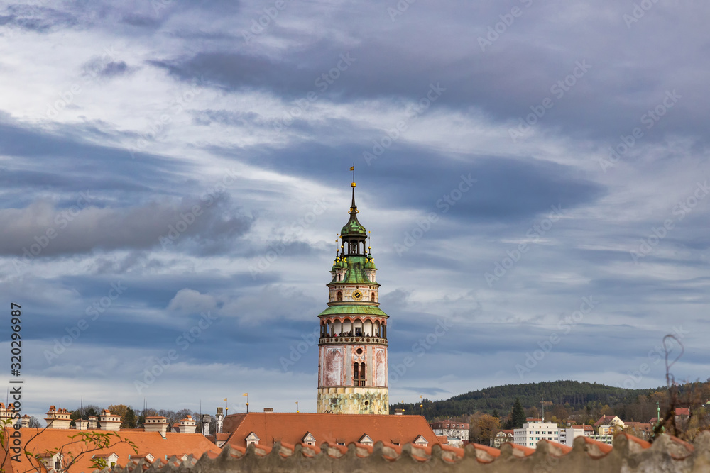 Cesky Krumlov castle tower view and cloudy sky, famous touristic destination in Czech Republic