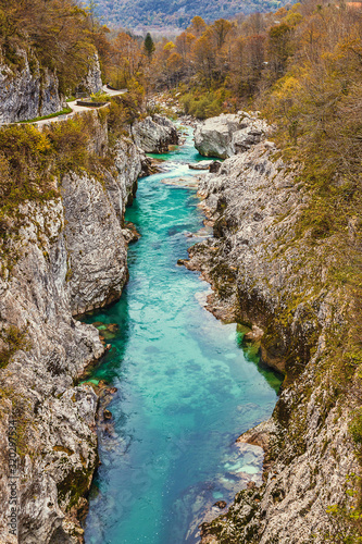 Beautiful turquoise waters and rocky banks of Soca river in Slovenia