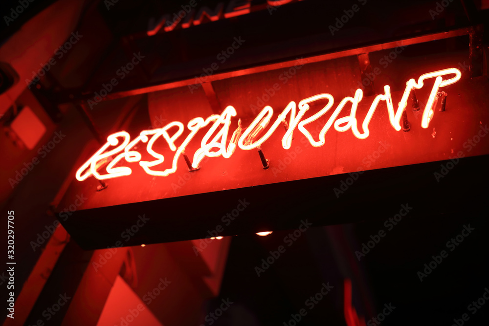 Glowing restaurant sign
