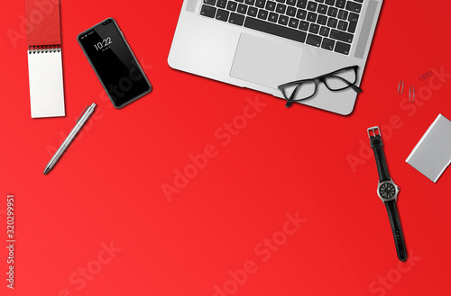 Office desk mockup top view isolated on red