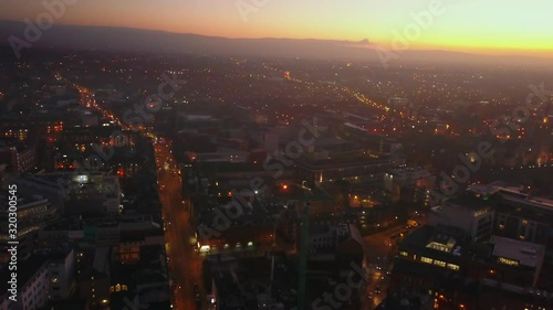 Flying over Dublin at sunset with cars and traffic below
4K 29fps photo