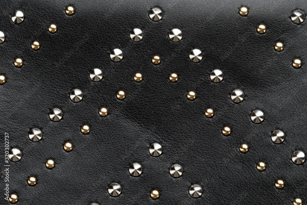leather background with metal rivets Stock Photo | Adobe Stock