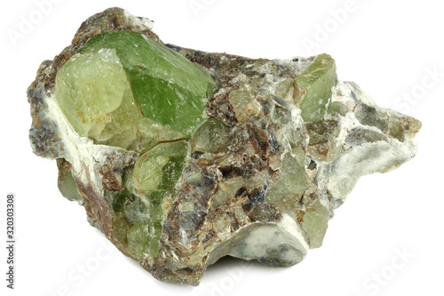 peridot on matrix from Kohistan Valley, Pakistan isolated on white background