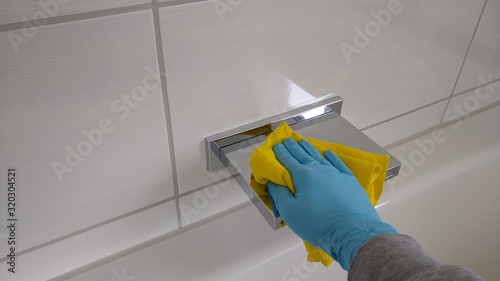 Household - cleaning the bathroom - cleaning - home cleaning - hand with yellow rag