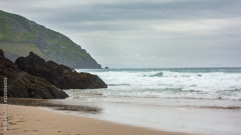 View of the Atlantic Ocean from Coumeenoole Beach, Dunquin on the Dingle Peninsula in west County Kerry, Ireland.
