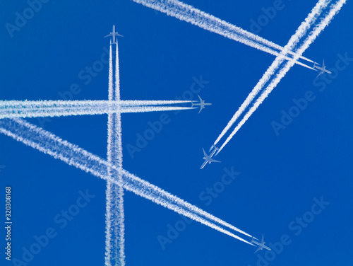 Canvas Print Several aircraft with white contrails