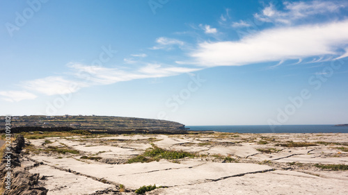 The rugged, limestone landscape of Inishmaan, one of the Aran Islands off the west coast of Galway, Ireland.  photo